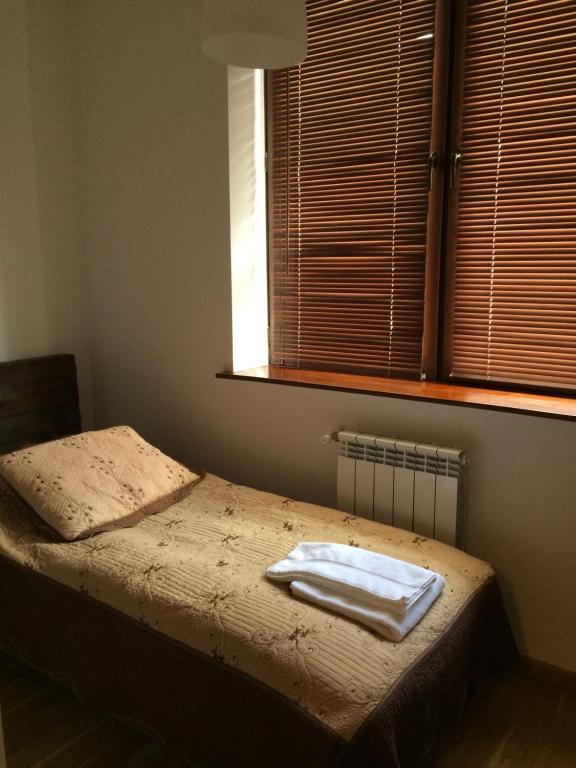 Кровать или кровати в номере Chalet Marina Gudauri