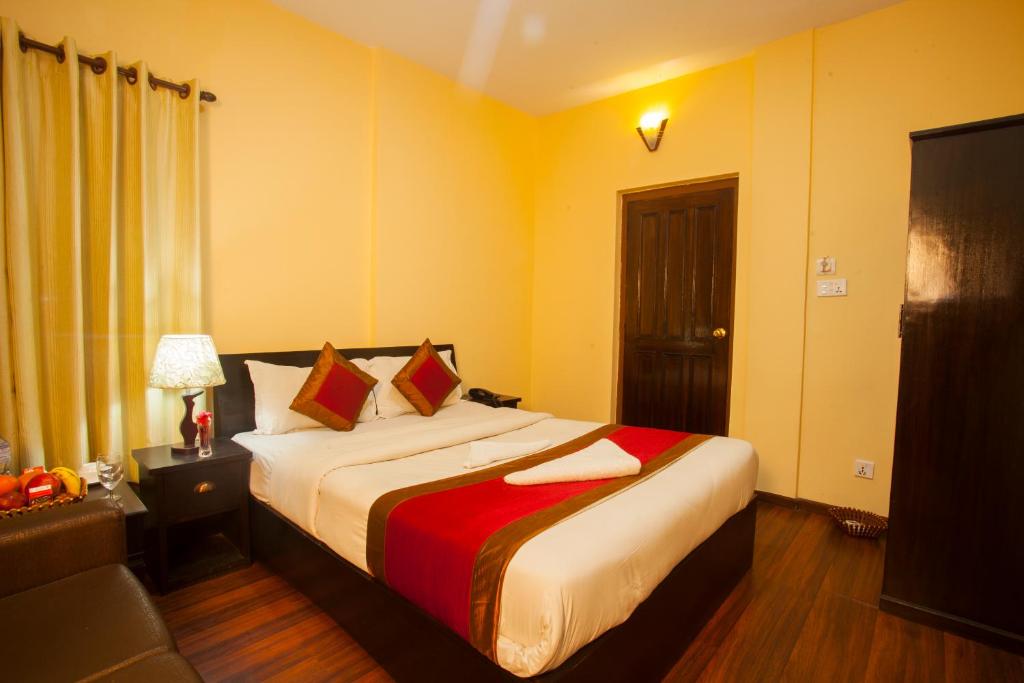Postel nebo postele na pokoji v ubytování Hotel Dream City