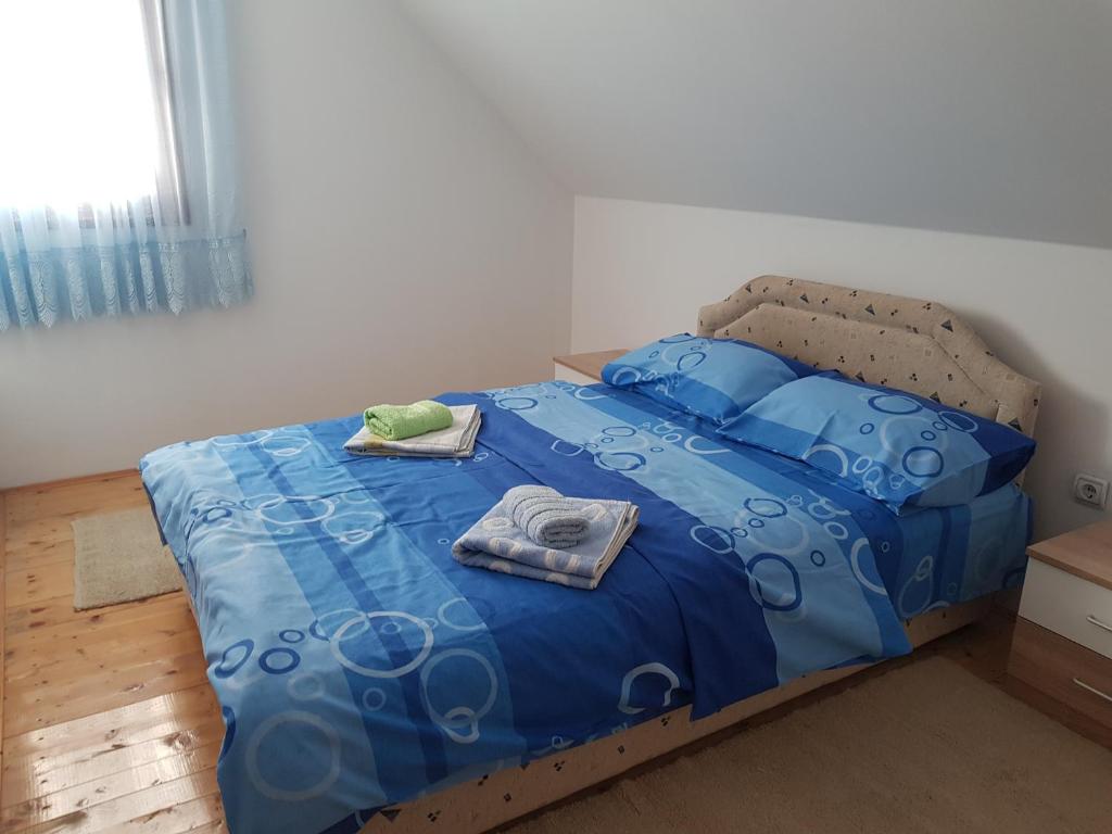 Postel nebo postele na pokoji v ubytování Deluxe Studio & Rooms Zarubica