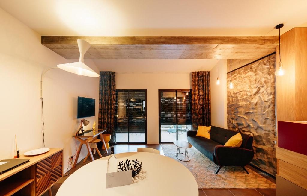 Posezení v ubytování Citta di Lume Suites & Lofts