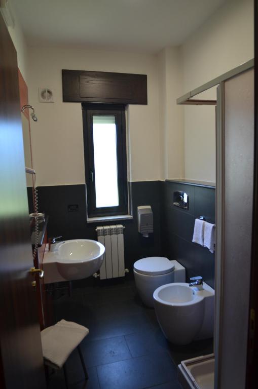 Koupelna v ubytování Hotel Toscano