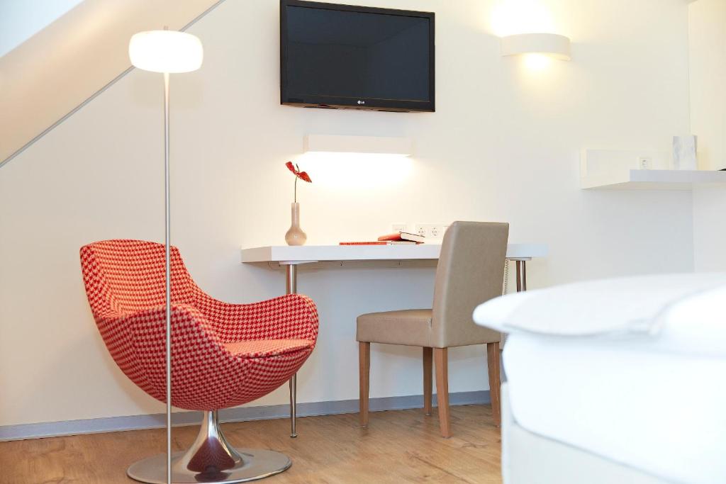 TV a/nebo společenská místnost v ubytování Landhotel Sonne