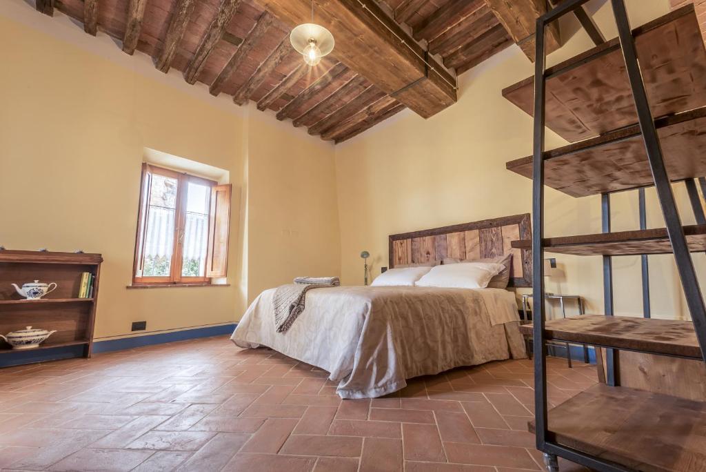 Postel nebo postele na pokoji v ubytování Porta delle Farine