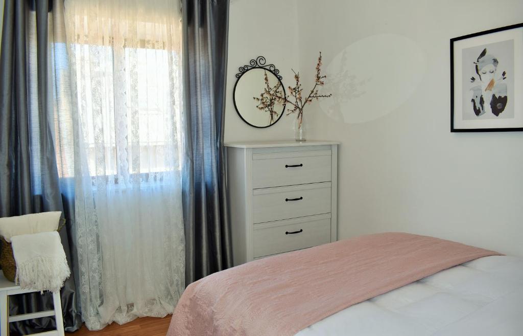 Postel nebo postele na pokoji v ubytování Apartment Antonija