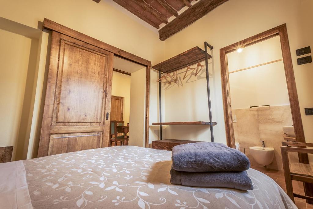 Postel nebo postele na pokoji v ubytování Porta delle Farine