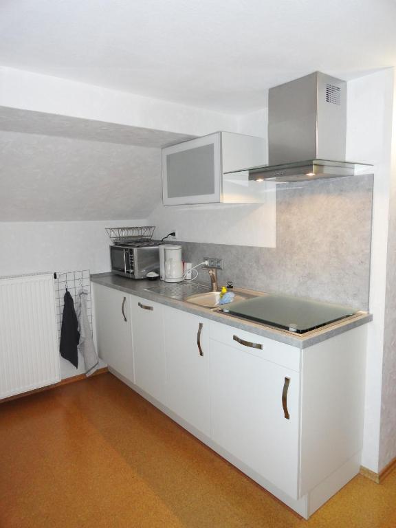 Kuchyň nebo kuchyňský kout v ubytování Appartement Pension Schüßler