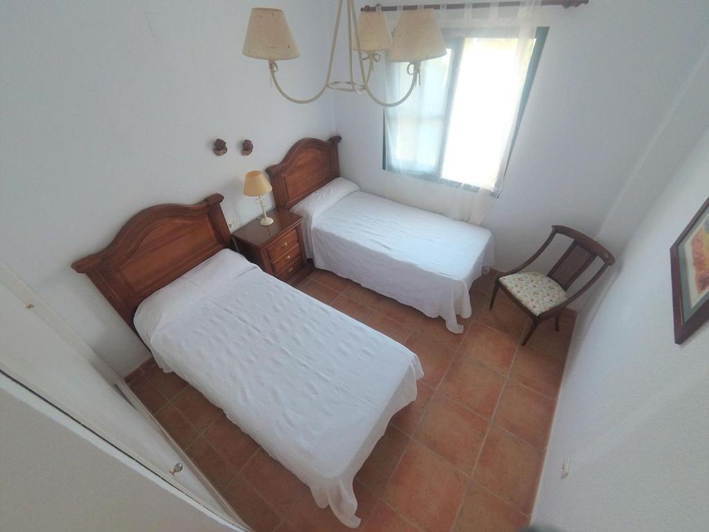 Posteľ alebo postele v izbe v ubytovaní Casa En Primera Linea De Playa