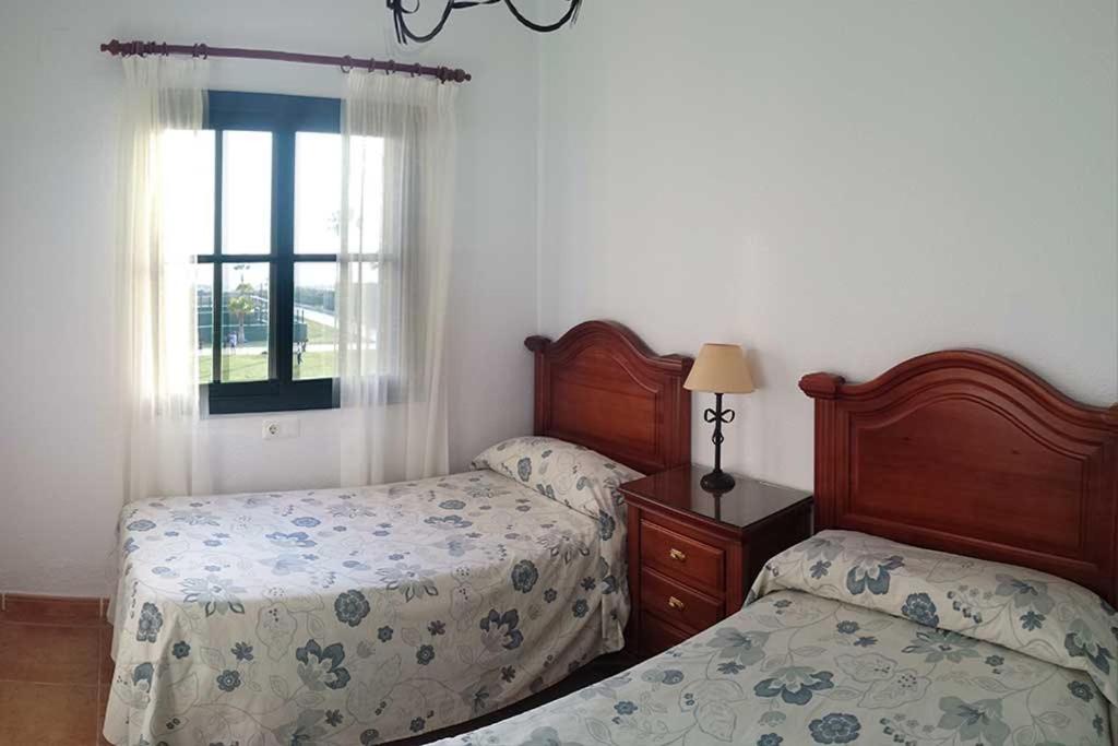 Posteľ alebo postele v izbe v ubytovaní Casa En Primera Linea De Playa