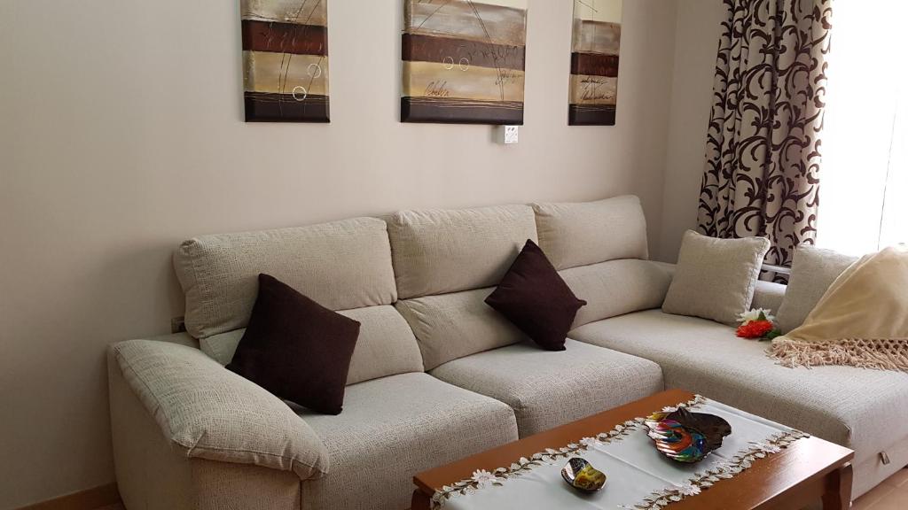 Uma área de estar em Apartamento Nerja Beach