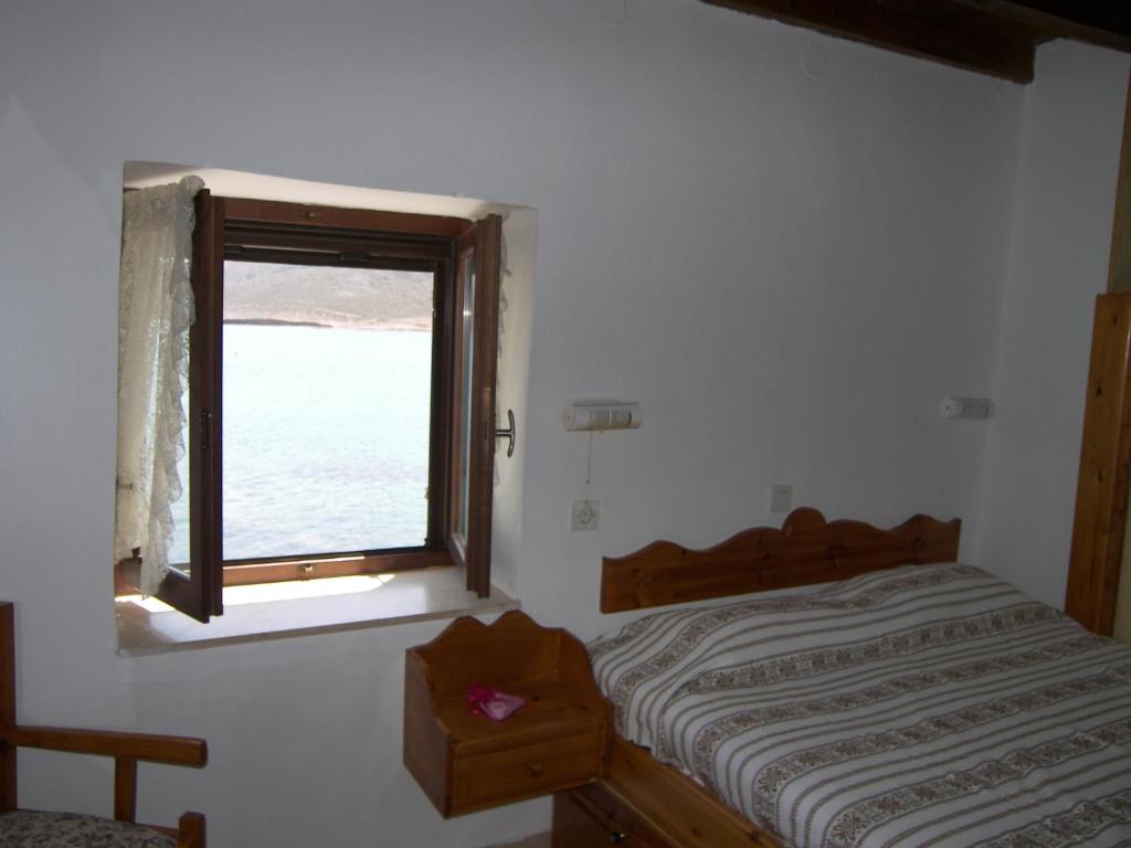 Posteľ alebo postele v izbe v ubytovaní Hiona Cottage
