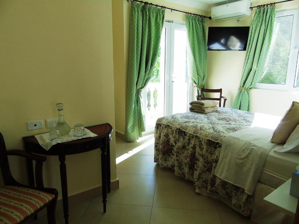 Postel nebo postele na pokoji v ubytování Taboga Palace SPA Hotel