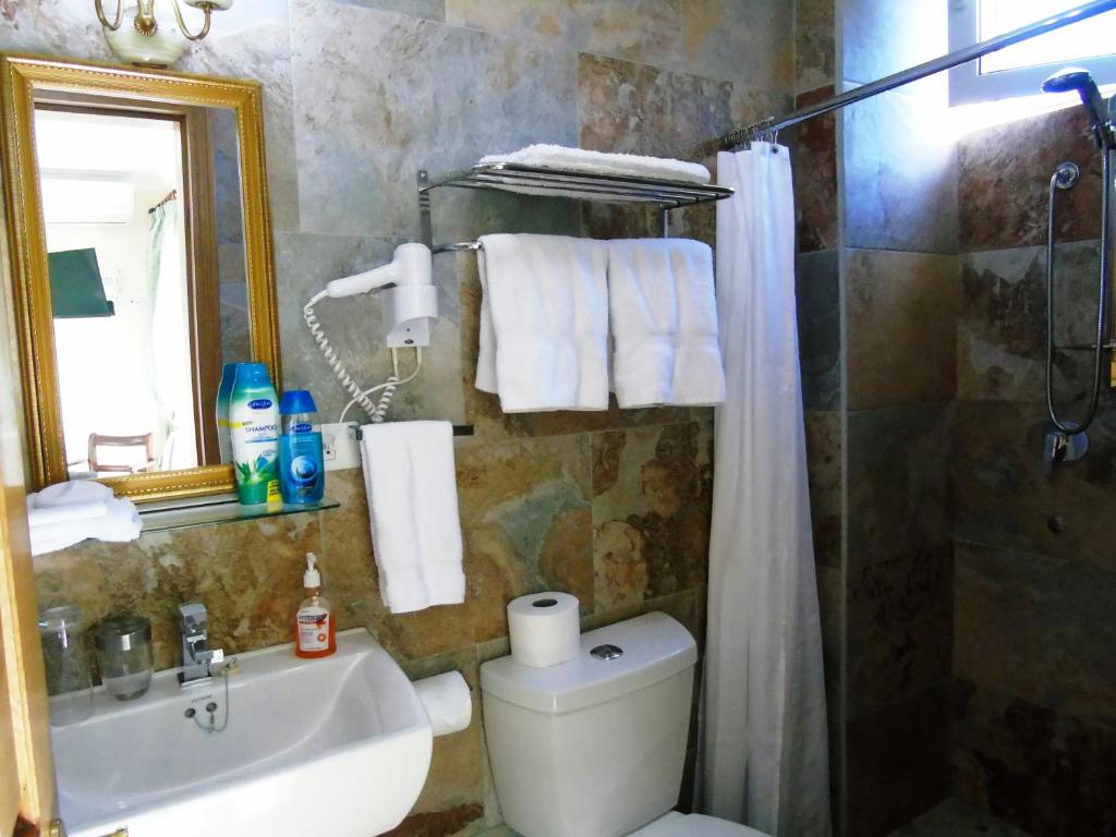 Koupelna v ubytování Taboga Palace SPA Hotel