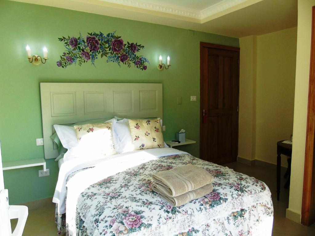 Postel nebo postele na pokoji v ubytování Taboga Palace SPA Hotel