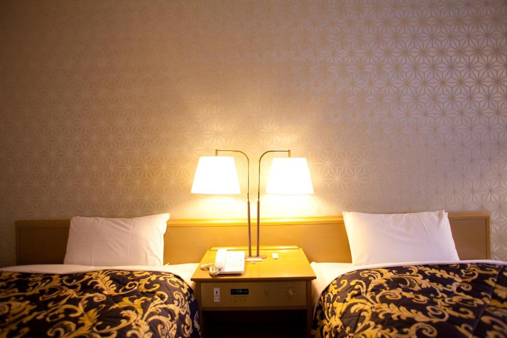 Postel nebo postele na pokoji v ubytování Ranzan