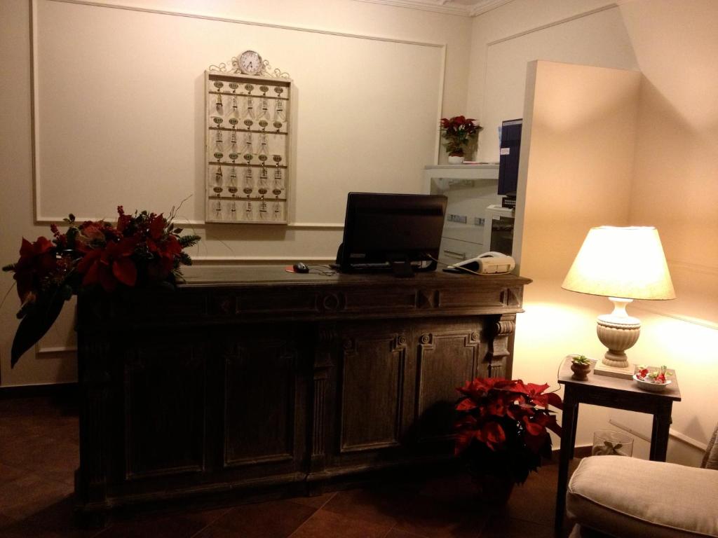 TV a/nebo společenská místnost v ubytování Hotel Villa Calandrino