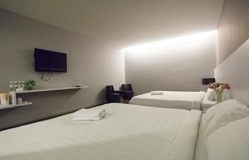 Postel nebo postele na pokoji v ubytování Chariton Hotel Ipoh