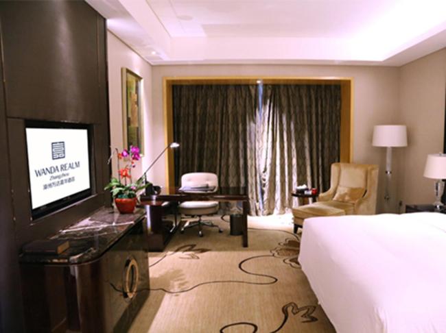 TV a/nebo společenská místnost v ubytování Wanda Realm Zhangzhou