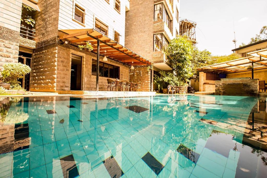Bazén v ubytování Kates Apartments nebo v jeho okolí