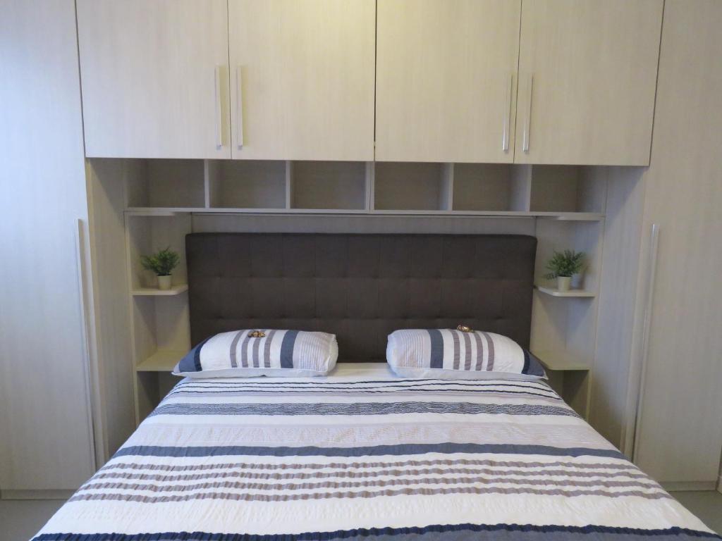 Postel nebo postele na pokoji v ubytování Assago Forum Apartment