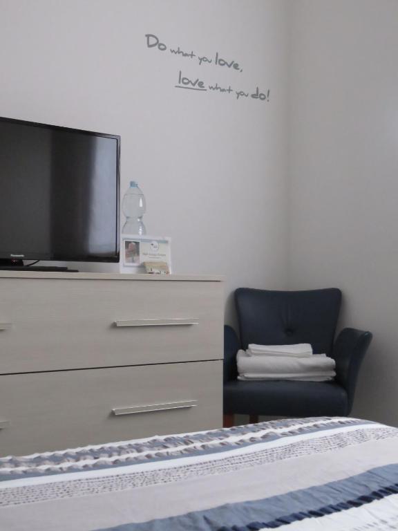 TV a/nebo společenská místnost v ubytování Assago Forum Apartment