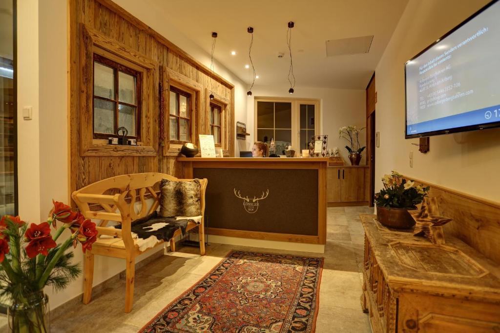 Televízia a/alebo spoločenská miestnosť v ubytovaní Kösslerhof