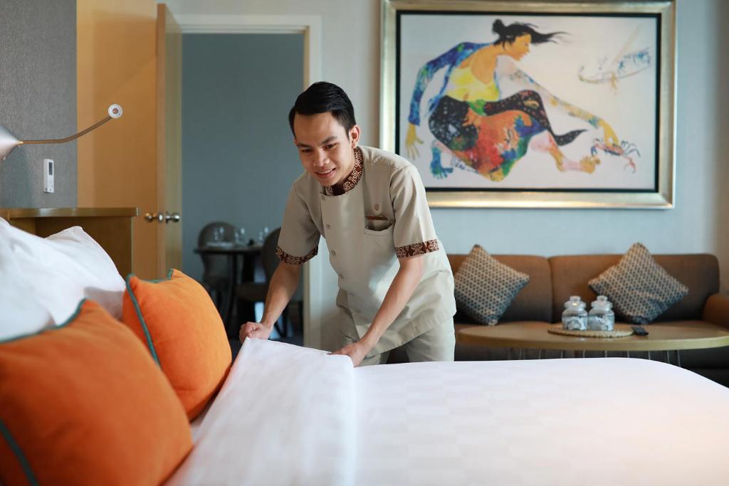Katil atau katil-katil dalam bilik di Hotel Ciputra Cibubur managed by Swiss-Belhotel International