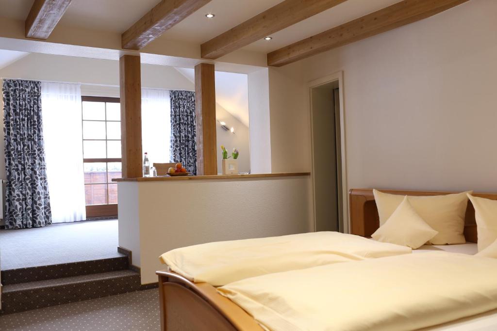 Voodi või voodid majutusasutuse Hotel Thüringer Hof toas