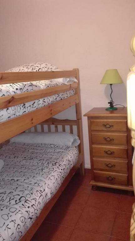 Postel nebo postele na pokoji v ubytování Casa Rural el Canal