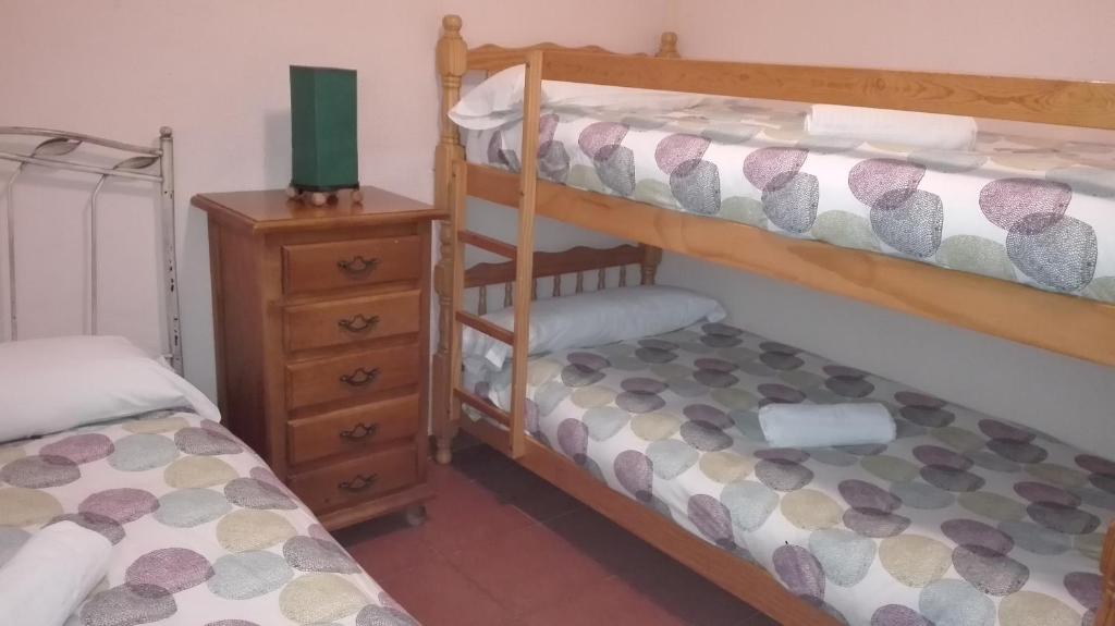 Postel nebo postele na pokoji v ubytování Casa Rural el Canal