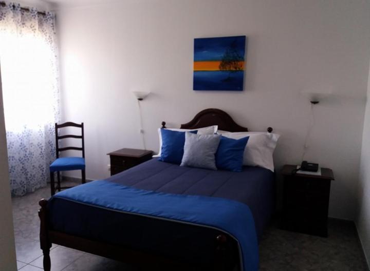 Postel nebo postele na pokoji v ubytování Hotel Branco II
