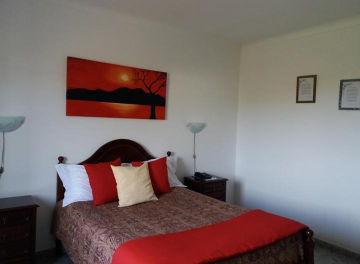 Postel nebo postele na pokoji v ubytování Hotel Branco II