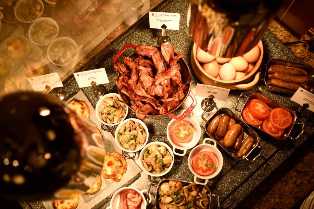 a buffet with different types of food on a table at Grand Hotel Bucharest in Bucharest