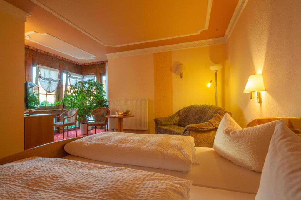 Voodi või voodid majutusasutuse Hotel Thüringer Hof toas