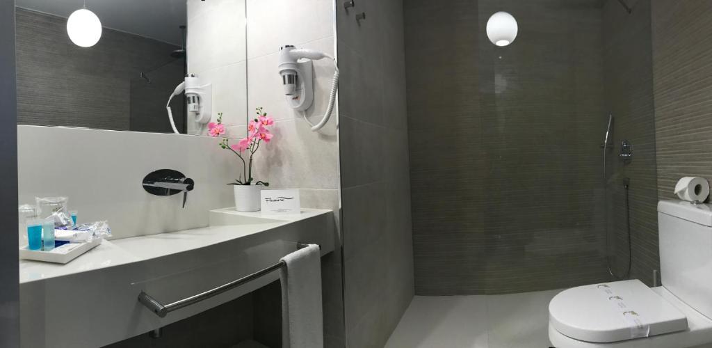 Koupelna v ubytování Hotel Flamero