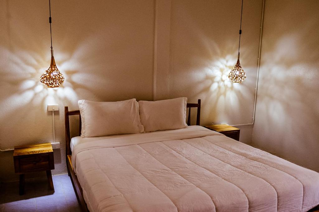 Postel nebo postele na pokoji v ubytování 7 Rooms Kohchang