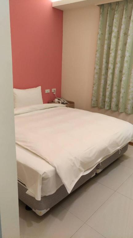 Postel nebo postele na pokoji v ubytování Galaxy Mini Inn