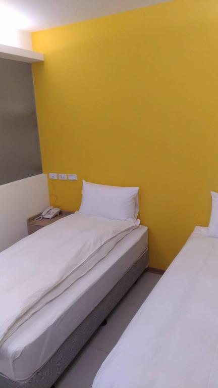 Postel nebo postele na pokoji v ubytování Galaxy Mini Inn