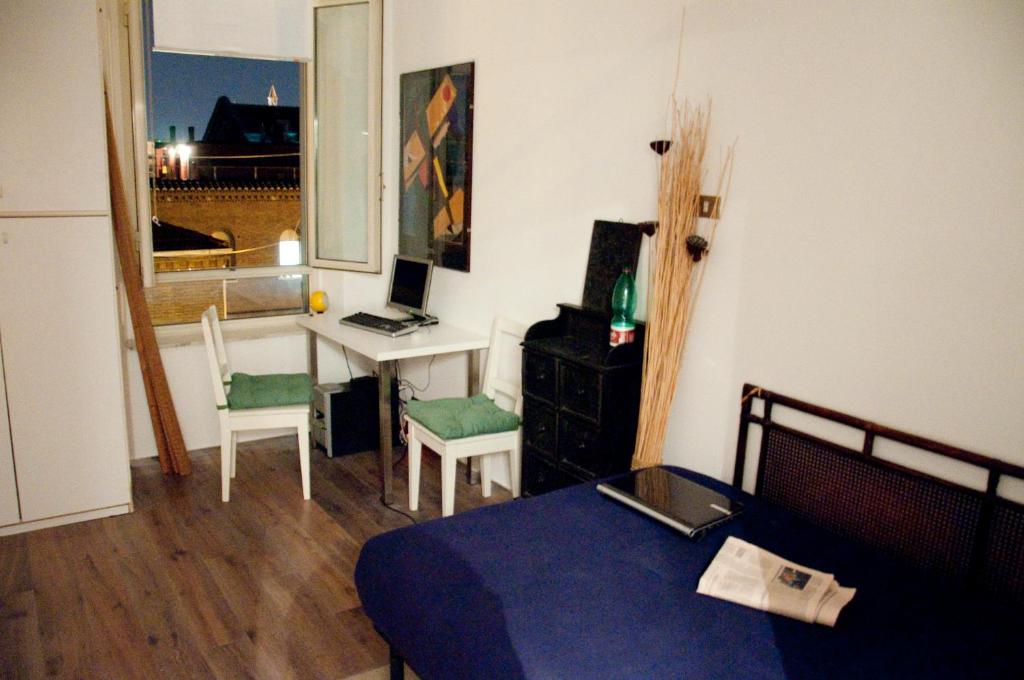 Łóżko lub łóżka w pokoju w obiekcie BEACHBAR Apartment in Rome