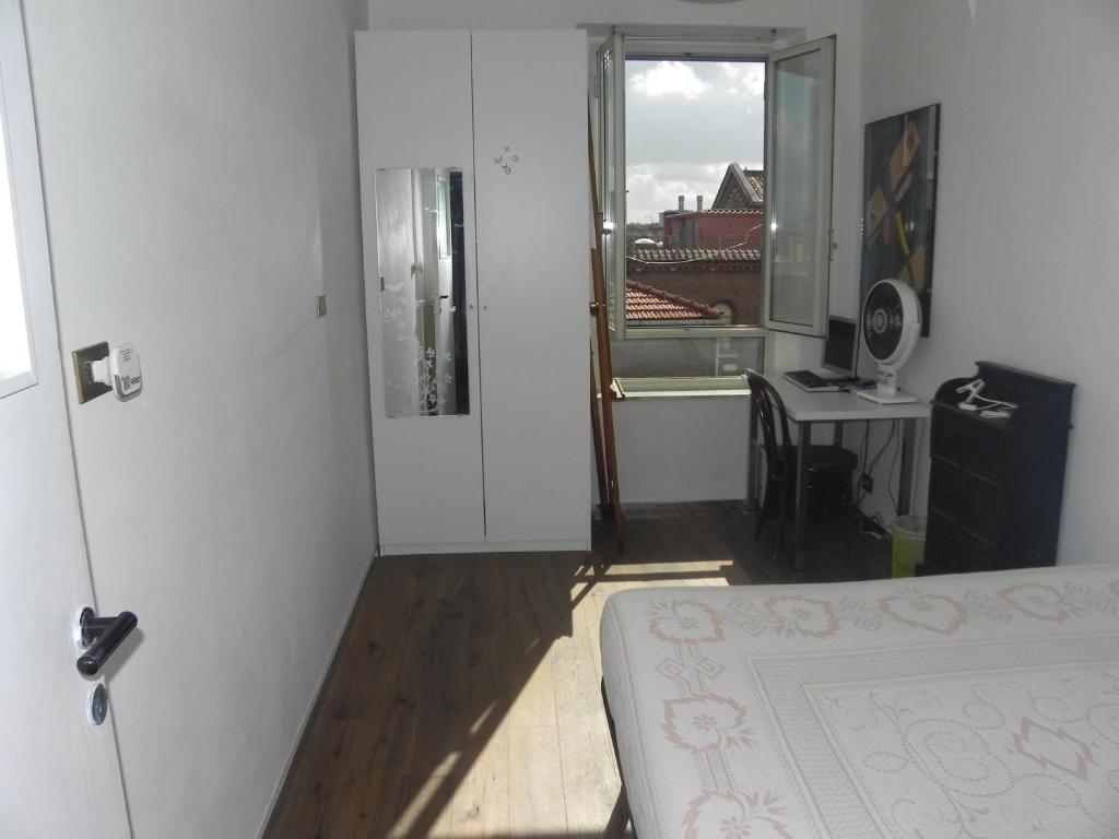 Łóżko lub łóżka w pokoju w obiekcie BEACHBAR Apartment in Rome