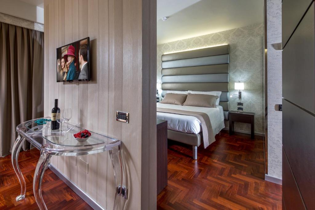 Postel nebo postele na pokoji v ubytování Enea Hotel Pomezia