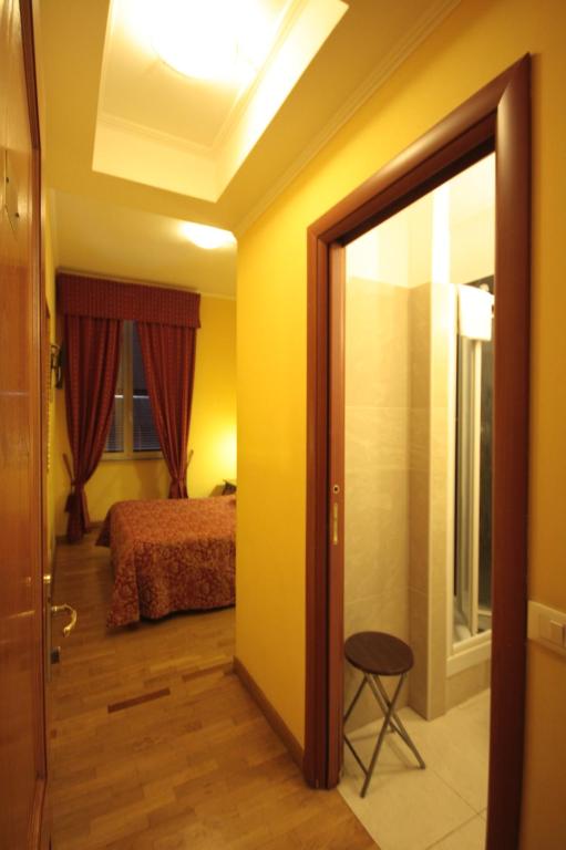 Postel nebo postele na pokoji v ubytování Hotel Termini