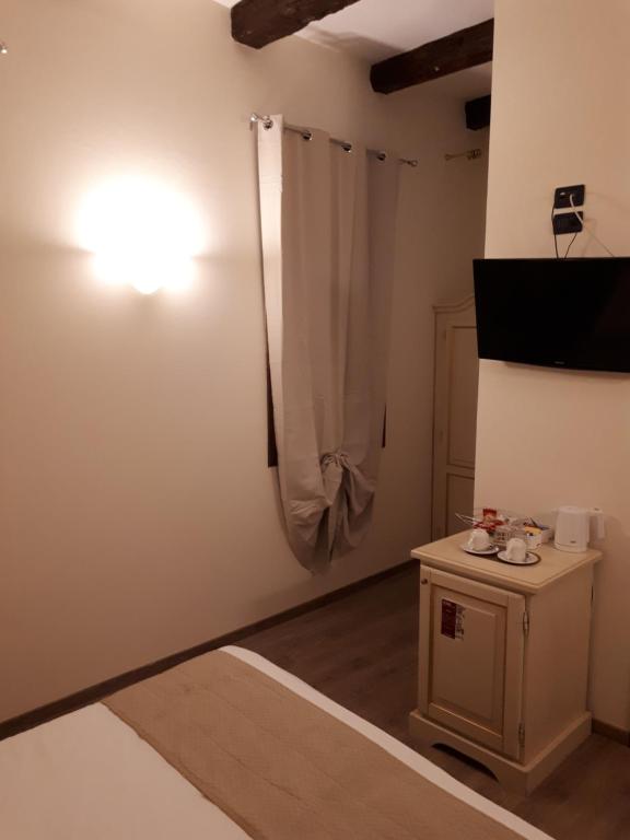 A bed or beds in a room at Cà Doge