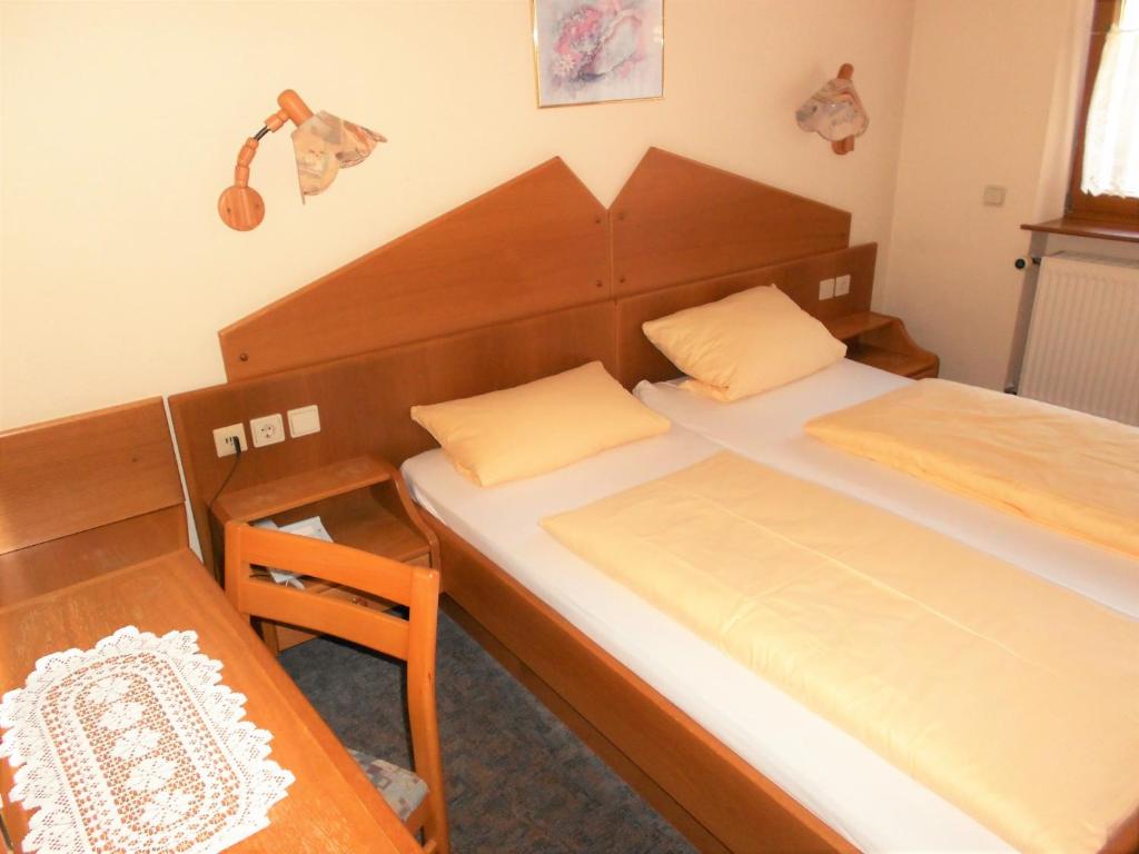 Postel nebo postele na pokoji v ubytování Blick zum Maimont