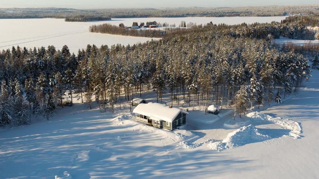 an aerial view of a truck covered in snow at Villa Mustikkakumpu in Sonka