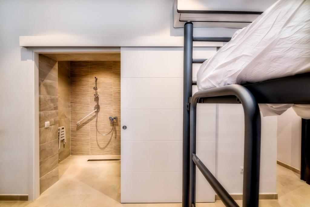 Postel nebo postele na pokoji v ubytování Hostel A2C