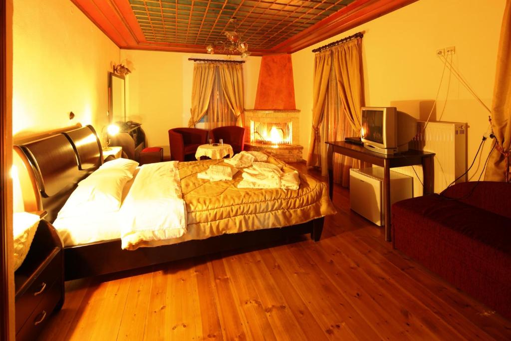 Postel nebo postele na pokoji v ubytování Hotel Ladias