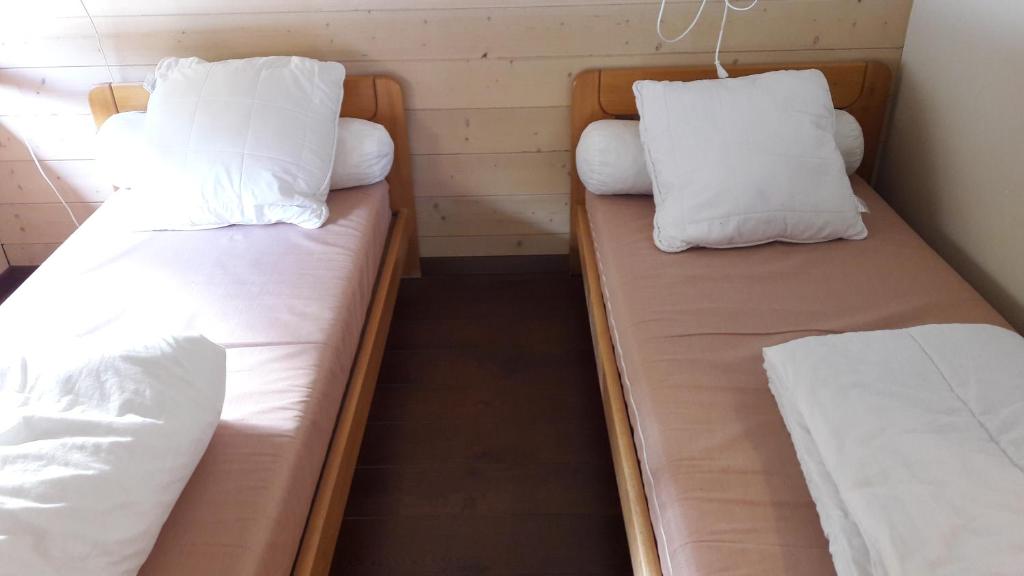 Letto o letti in una camera di Domaine du Bugnon