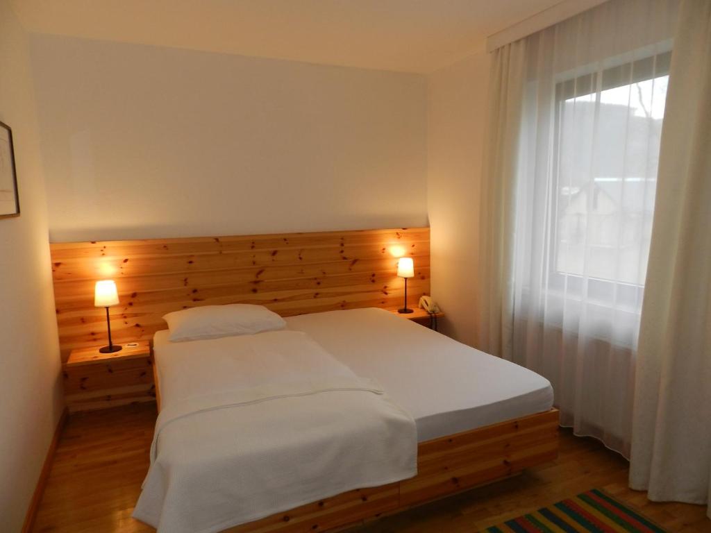 Postel nebo postele na pokoji v ubytování Landhaus Kügler-Eppich, KuEp KG