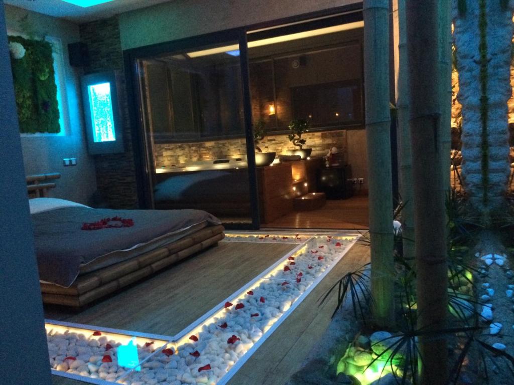 Postel nebo postele na pokoji v ubytování B&B Villa sensorielle
