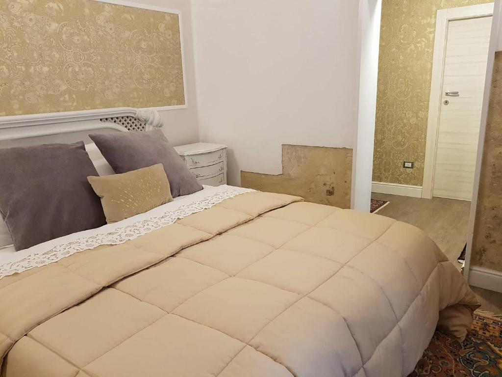 Postel nebo postele na pokoji v ubytování Leodi